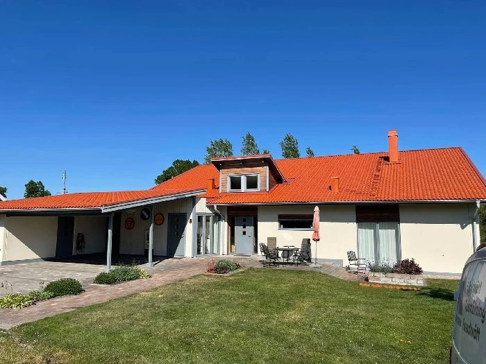 Professionell takmålning utförd av Takexperterna